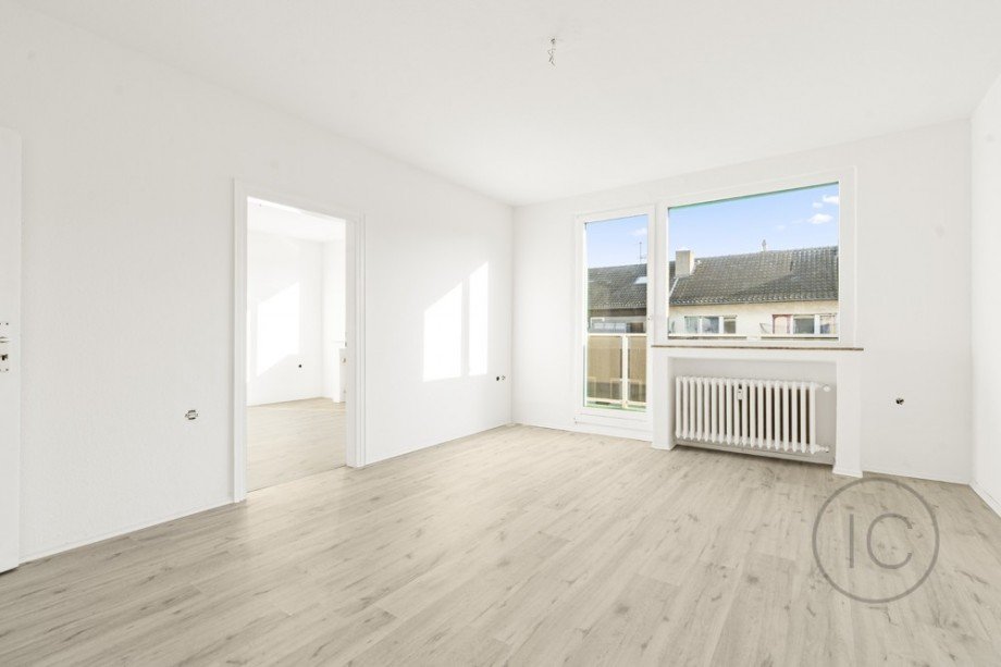 Wohnzimmer 3-Zimmer-Wohnung renoviert Mehrfamilienhaus Krefeld / Cracau